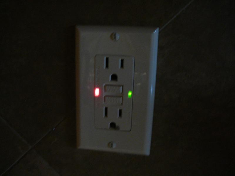 gfci outlet yellow light wont reset